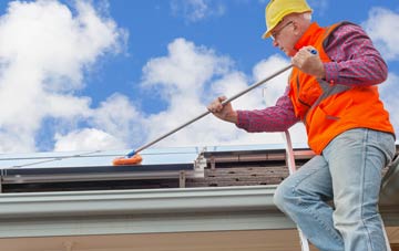 Lady soft wash roof cleaning